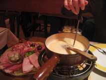 
Fondue in Chamonix after a day of snowboarding. I knew it was bad for me, but it was soooo good, we finished it all (and the side of charcuterie).
