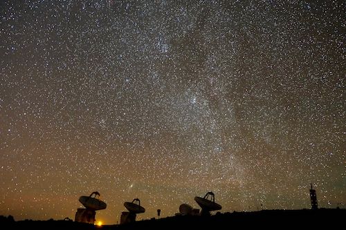 Image of radio telescope antennas at sunset, Mauna Kea, Hawaii, SMA Observatory, photo cred: Nimesh Patel (CFA)