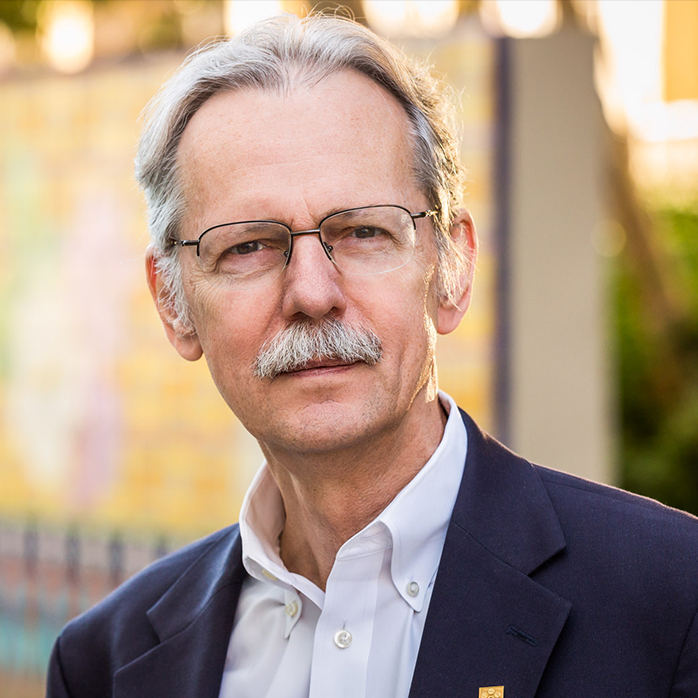 Charles Alcock headshot