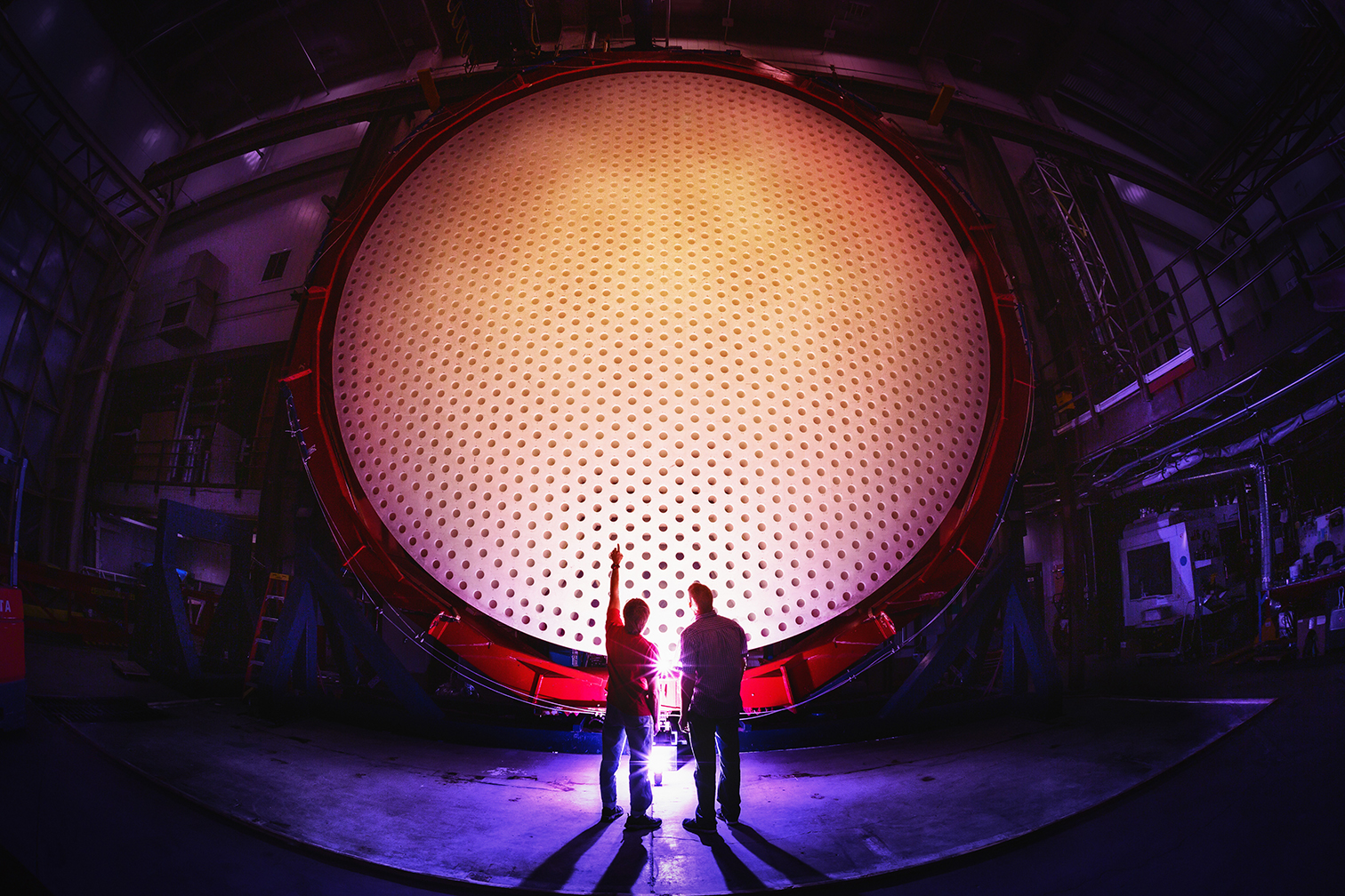 The Giant Magellan Telescope primary mirror segment 5 sits vertically at the Richard F. Caris Mirror Lab at the University of Arizona. Each of the seven mirror segments of the Giant Magellan Telescope is 8.4 meters in diameter, together forming a single optical surface of 24.5 meters with a total collecting&nbsp;area of 368 square meters.
