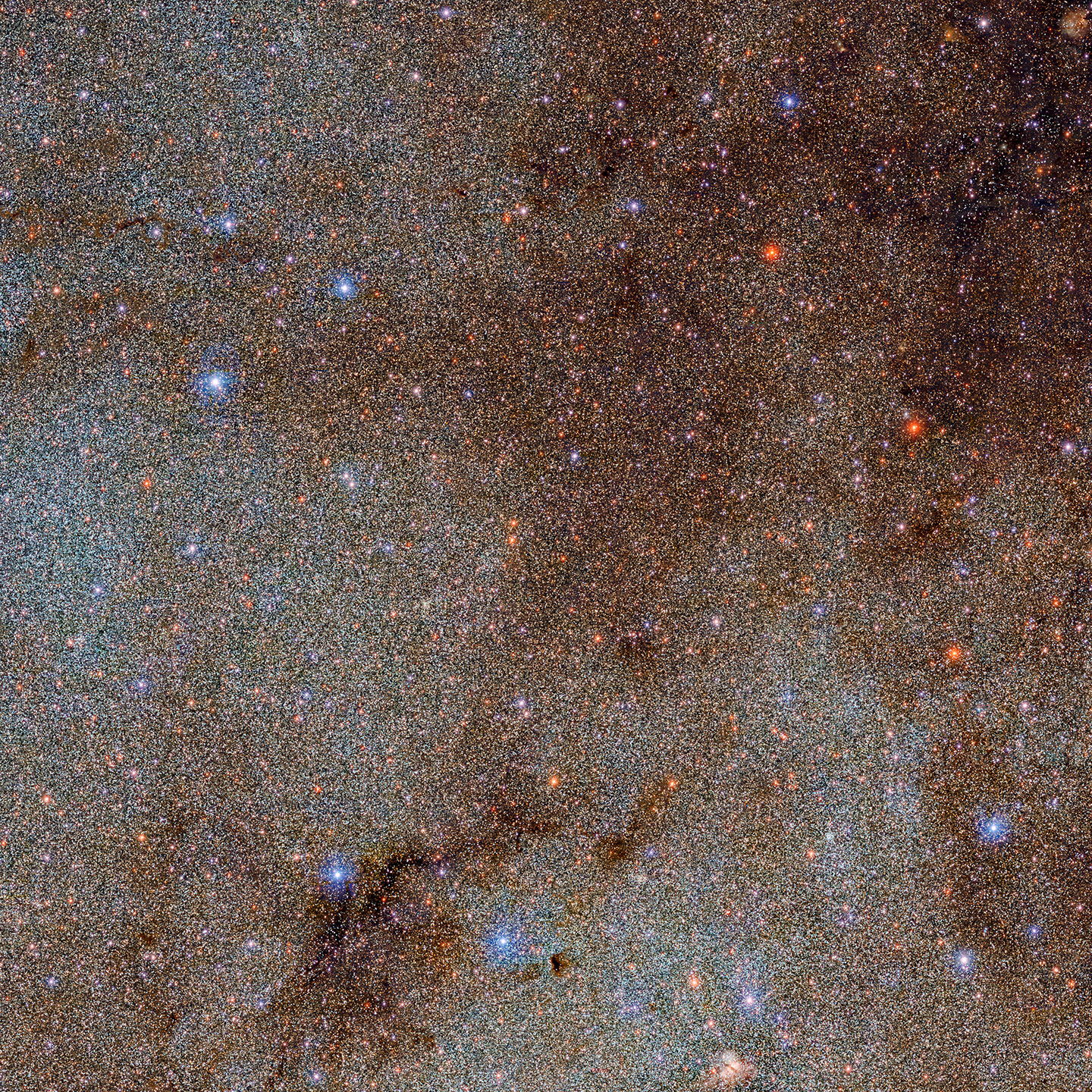 This image, which is brimming with stars and dark dust clouds, is a small extract — a mere pinprick — of the full Dark Energy Camera Plane Survey (DECaPS2) of the Milky Way. The new dataset contains a staggering 3.32 billion celestial objects — arguably the largest such catalog so far.