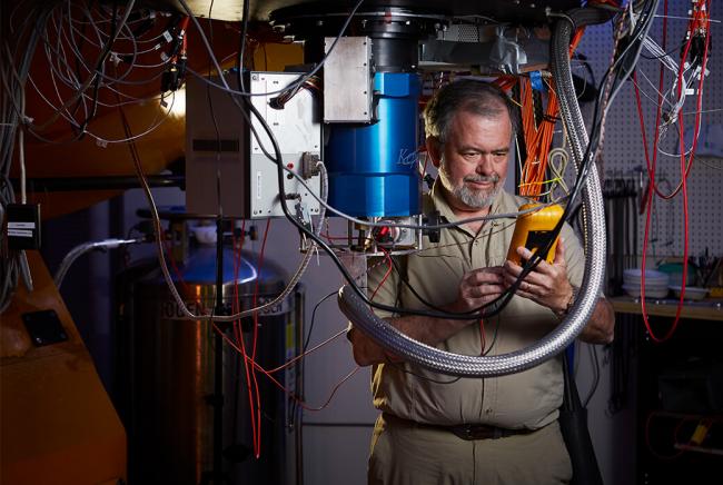 Astronomer Emilio Falco working on the 1.2-Meter Telescope