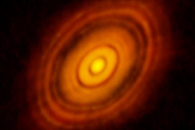 ALMA image of the young star HL Tau and its protoplanetary disk.