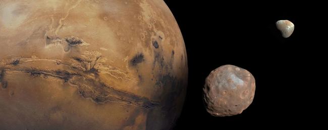 A composite image of Mars and its two moons, Phobos (foreground) and Deimos (background).
